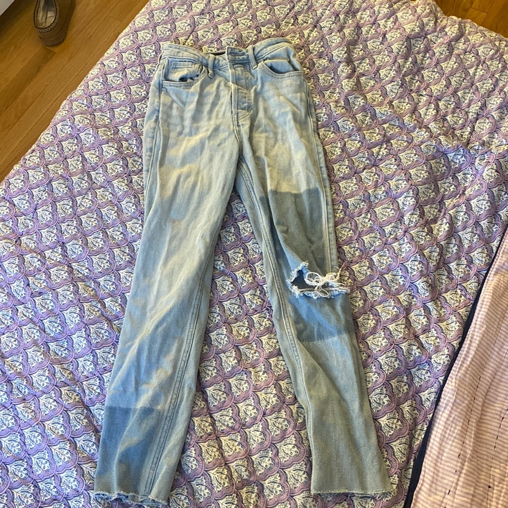 patch work jeans w/ rips,great condition,light wash w/ small darker wash patches